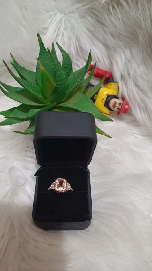 Rose Gold Emerald-Cut Halo Ring