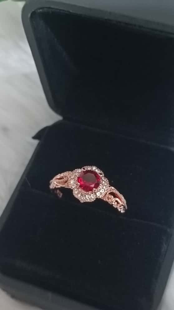 Vintage-Inspired Rose Gold Ring with Red Center Stone