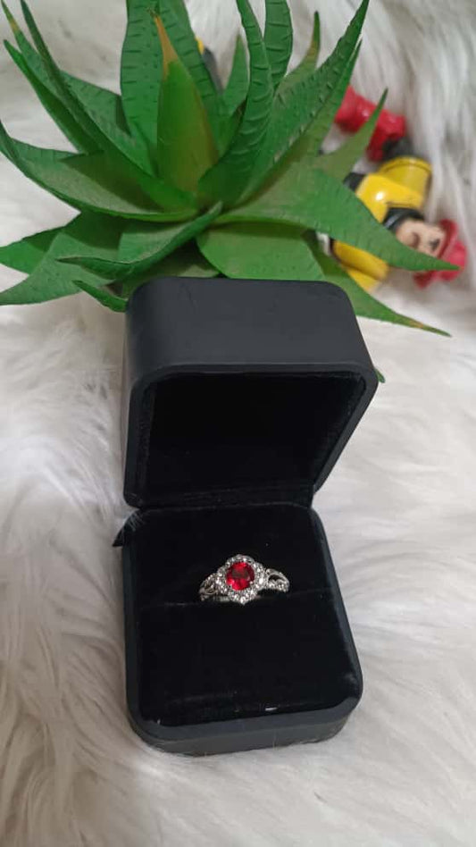 Vintage-Inspired Rose Gold Ring with Red Center Stone